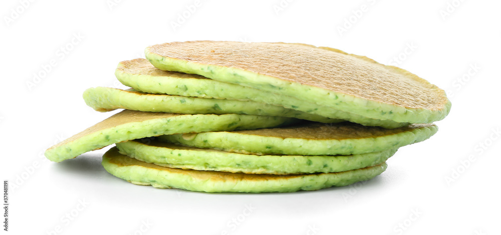 Tasty green pancakes on white background