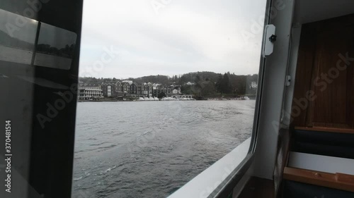 crossing a lake on a tourist boat.  photo