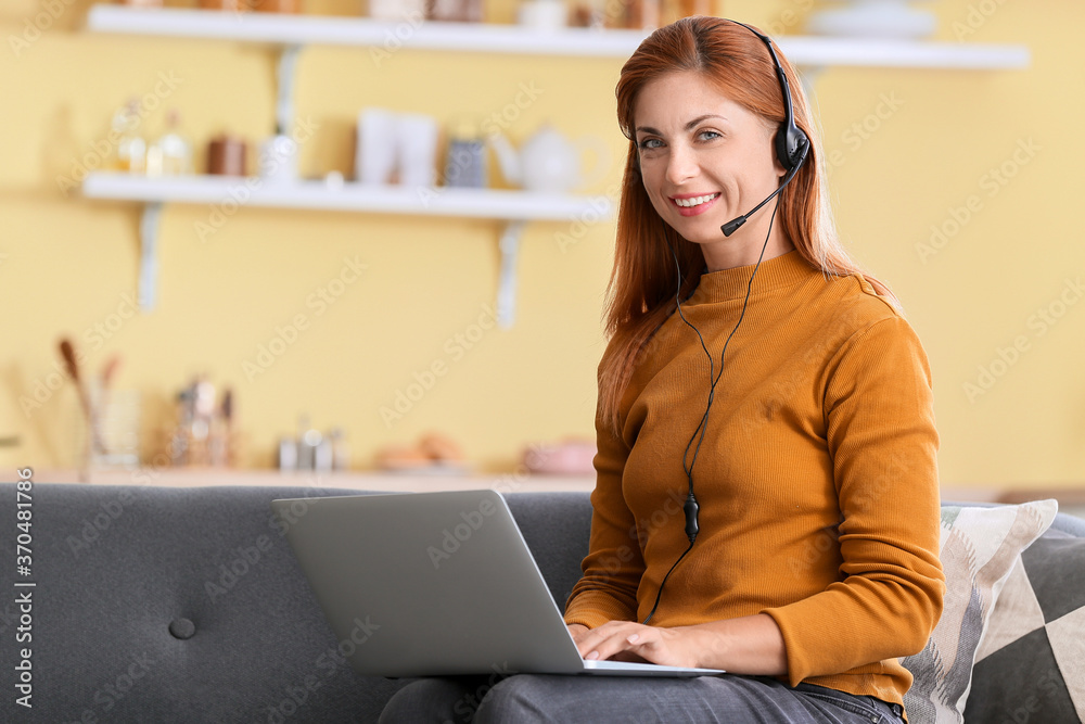 Woman with headset working at home Woman with headset working at home