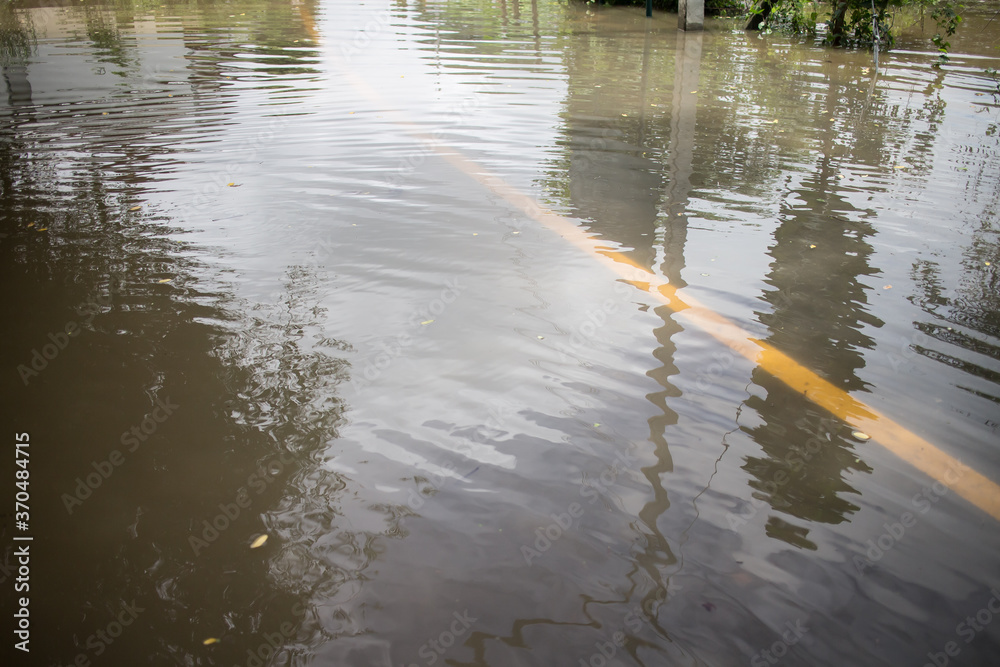 Fototapeta premium Flooding on the asphalt road