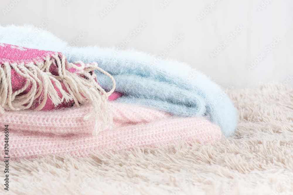 Cozy home, warm knitted wool clothes.