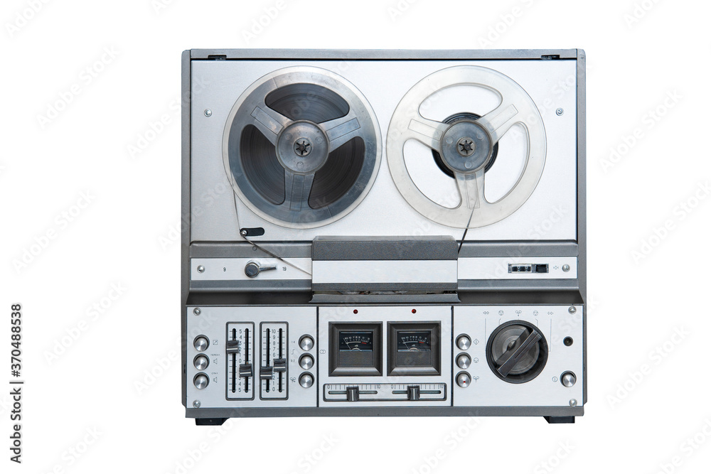 Obraz premium Stereo tape deck recorder player with reels on background.