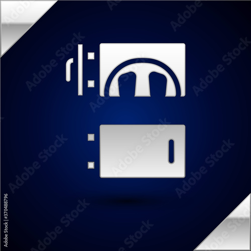 Silver Crematorium icon isolated on dark blue background. Vector.