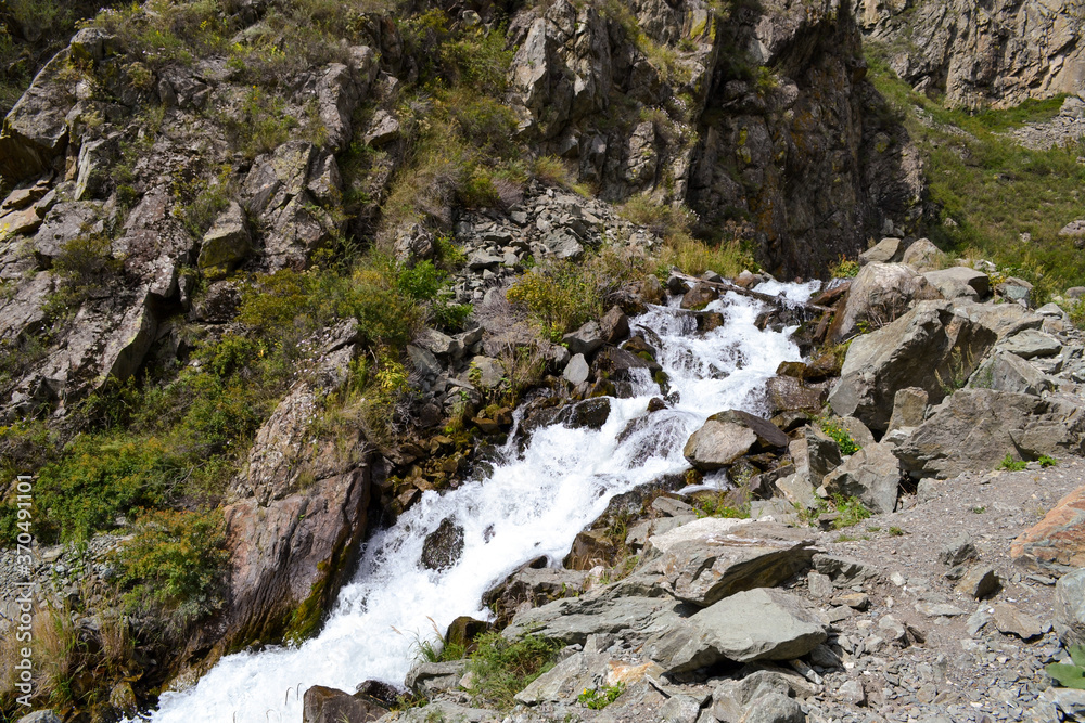 Beautiful waterfall in the Altai Mountains Beautiful waterfall in the Altai Mountains