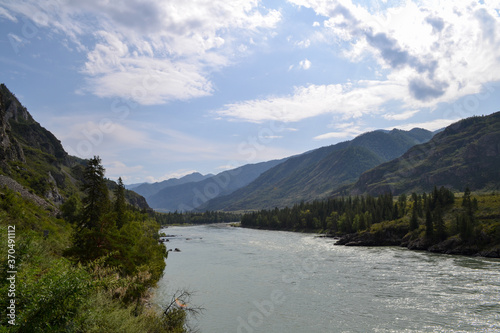A beautiful view of the Altai mountains and the Katun river flowing into the distance