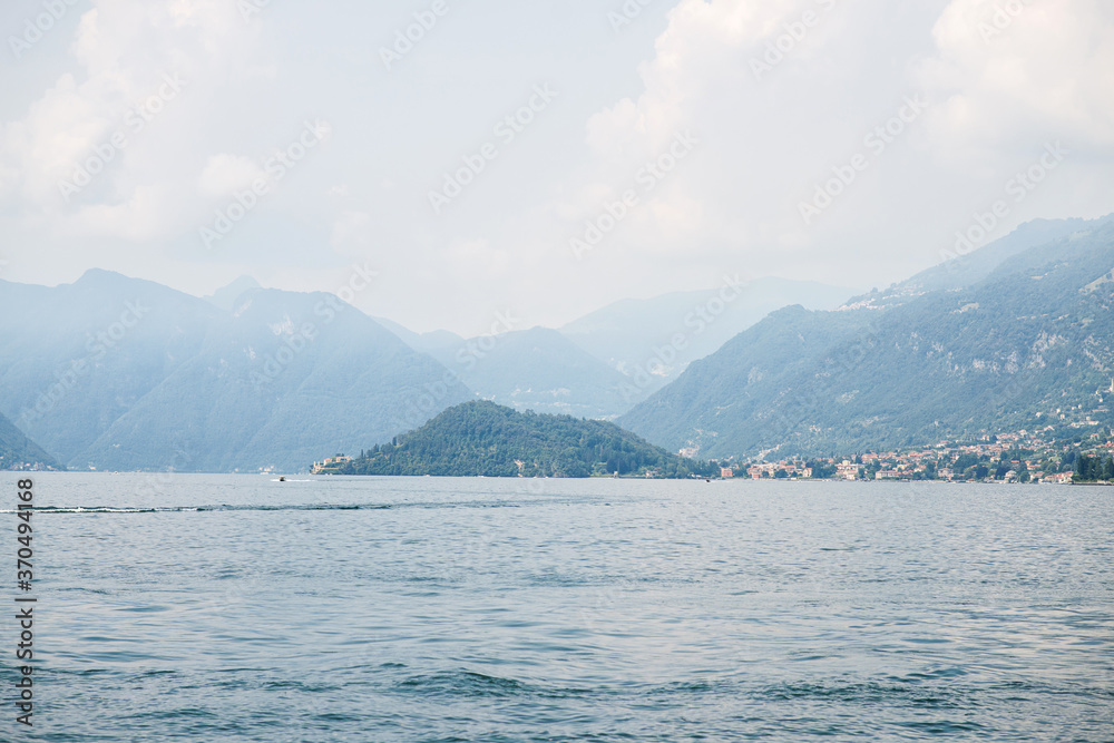 Picturesque Landscape on Lake Como with Alps on Background. Italy.