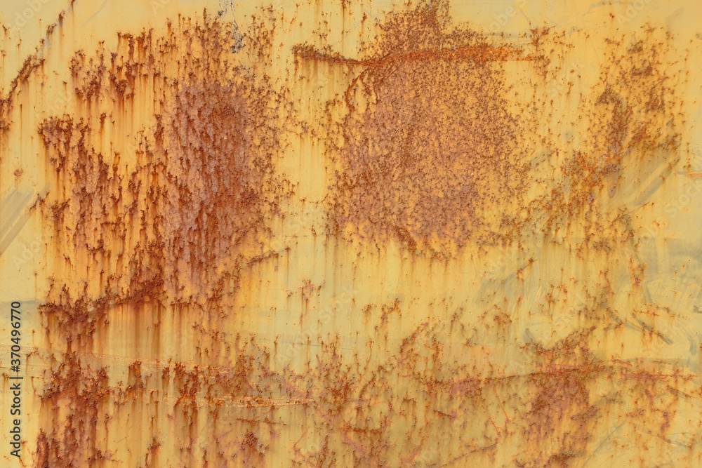 Rust surface. Close up of black rust on an old sheet of metal texture. 