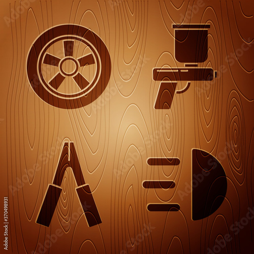 Set High beam, Car wheel, Car battery jumper power cable and Paint spray gun on wooden background. Vector.