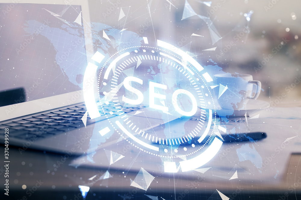 Double exposure of table with computer and seo drawing hologram. Search optimization concept. Double exposure of table with computer and seo drawing hologram. Search optimization concept.
