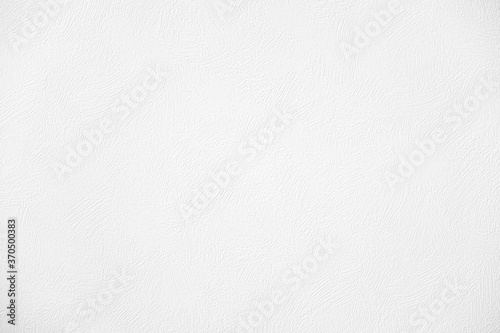 Texture of white vinyl wallpaper looks like a paint strokes on wall. Wallpaper for painting.
