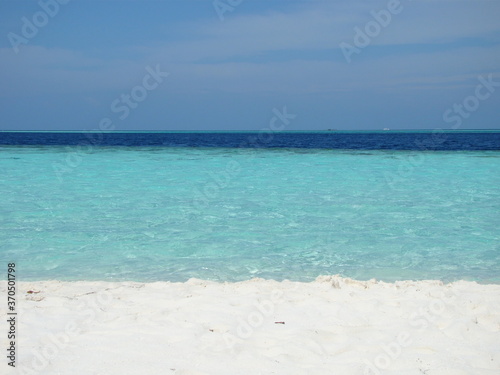 MALDIVES, BLUE SEA AND BEACH
