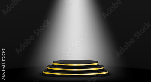 Black and gold round stage podium with light