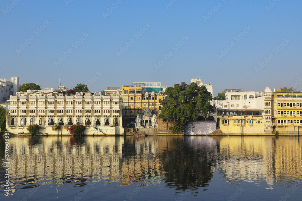 Naklejka premium Lake Pichola, situated in Udaipur city in the Indian state of Rajasthan, is an artificial fresh water lake, created in the year 1362 AD, named after the nearby Picholi village.