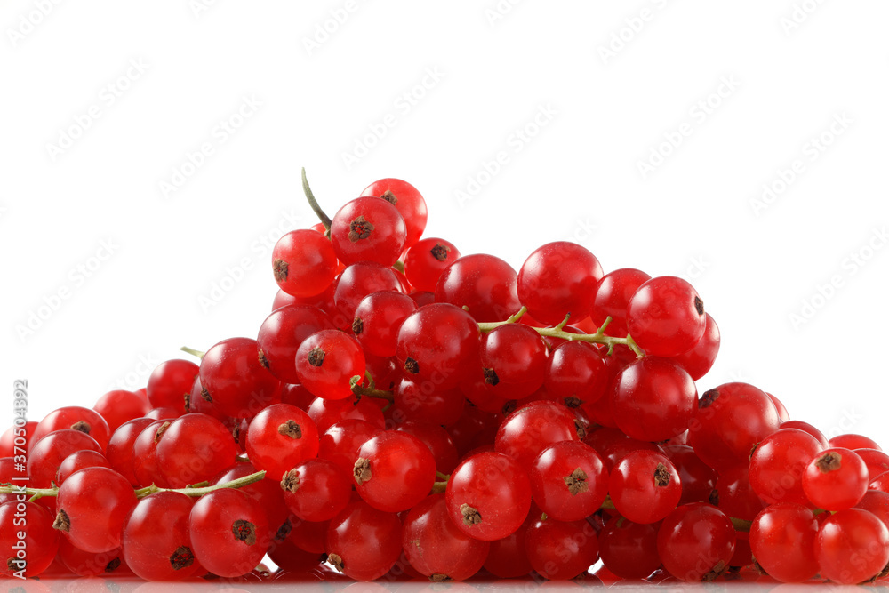 Heap of red currant  berries isolated on white background