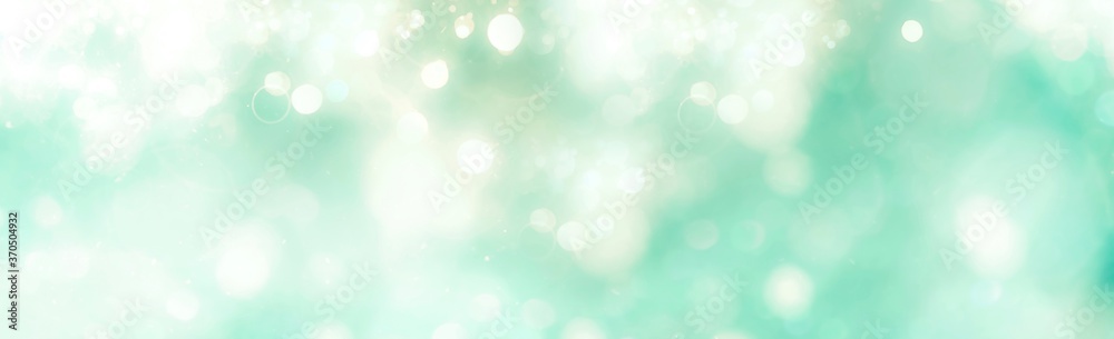 Abstract green Christmas background banner - pastel background with bokeh lights Abstract green Christmas background banner - pastel background with bokeh lights
