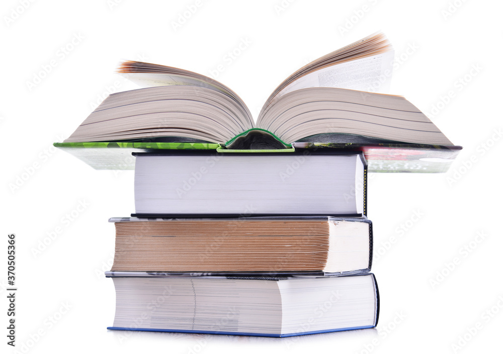 Composition with stack of books isolated on white Composition with stack of books isolated on white