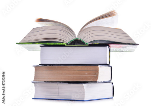 Composition with stack of books isolated on white