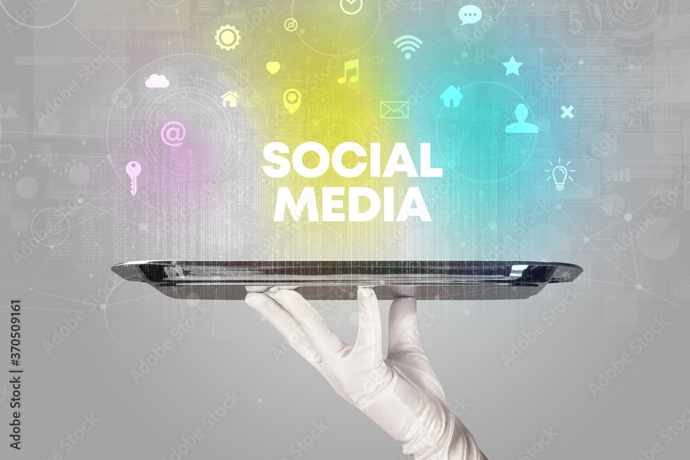 Waiter serving social networking with SOCIAL MEDIA inscription, new media concept