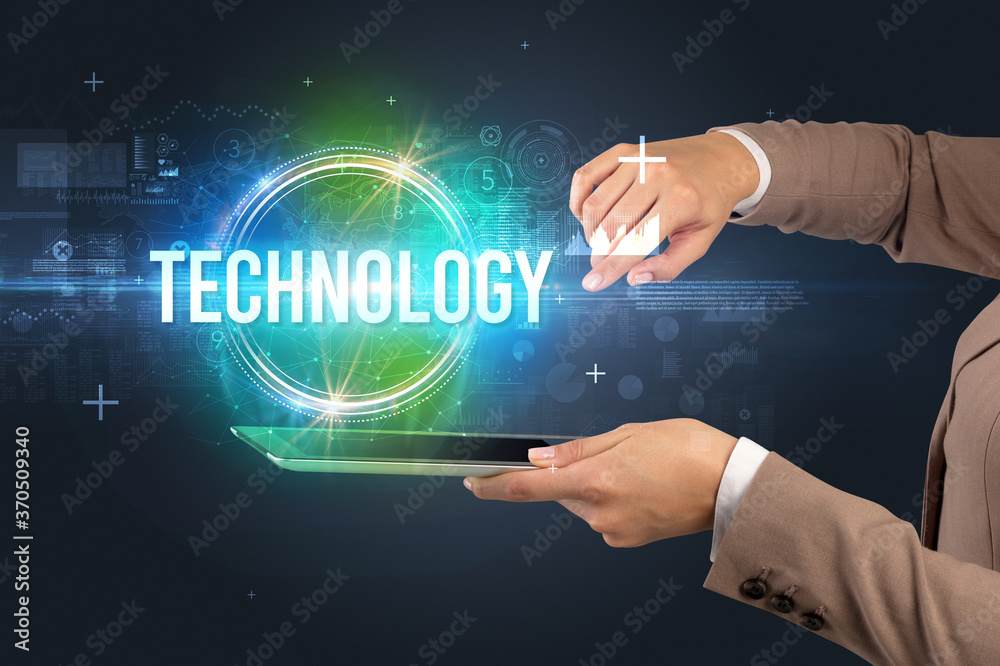 Close-up of a touchscreen with TECHNOLOGY inscription, new technology concept Close-up of a touchscreen with TECHNOLOGY inscription, new technology concept