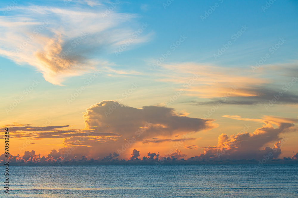 Beautiful sunset sky and cloud at the beach with ocean background. Beautiful sunset sky and cloud at the beach with ocean background.
