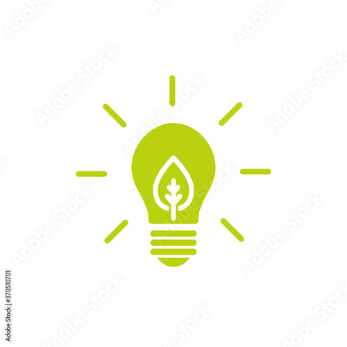 Green shining electric light bulb with green leaf. Isolated on White. Flat outline icon