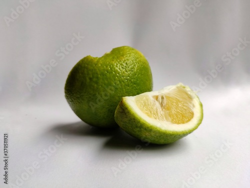 limon,mousambi, musambi, sweet lime, sweet lemon, and sweet limetta on light background photo