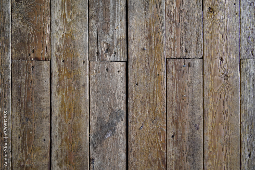 Naklejka premium Old brown wooden wall background texture close up