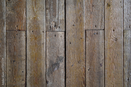 Old brown wooden wall background texture close up