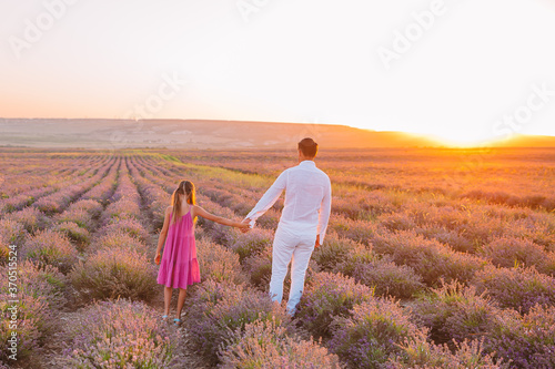 Family of two in lavender flowers field