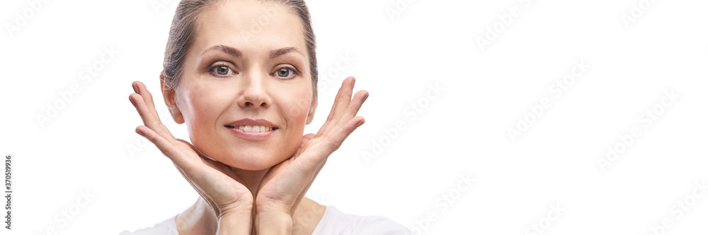 Happy pretty woman. Hands near face. Skincare concept. Home morning routine. Clean skin. Cream cosmetics. Cosmetology therapy. Rejuvenation procedure. White background. Copyspace