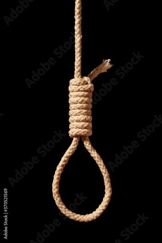suicide concept. noose isolated on black