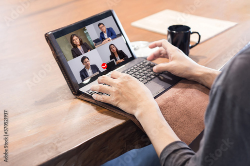 business people Working From Home Having Online Group Videoconference On tablet