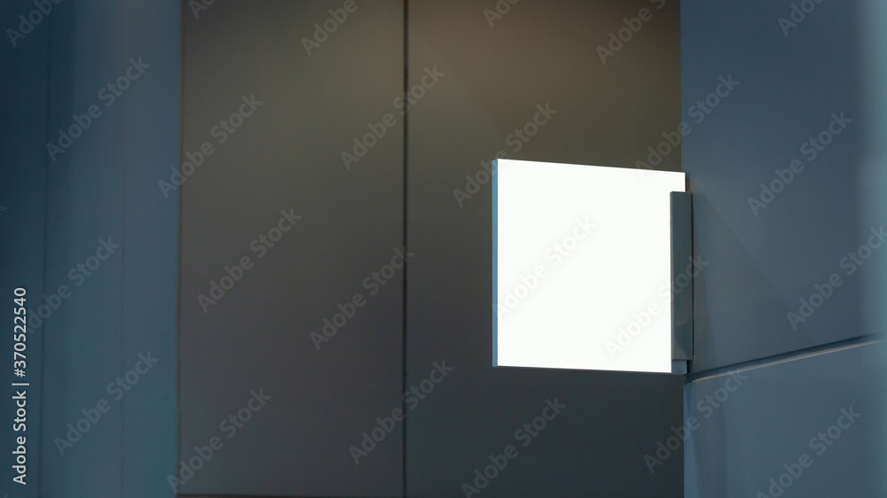Blank transparent sign plate design mockup mock up on the wall near office entrance interior. Signage panel door number template. Clear printing board for logo branding Blank transparent sign plate design mockup mock up on the wall near office entrance interior. Signage panel door number template. Clear printing board for logo branding