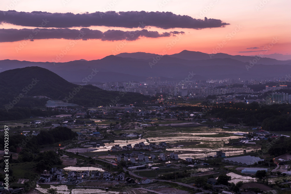 Obraz premium Beautiful landscape panoramic view of county side background curious clouds.