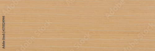 Natural ash veneer background in adorable light beige color. Natural wood texture, pattern of a long veneer sheet.