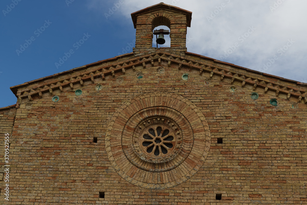 Facade of the ancient church of San Jacopo in San Gimignano