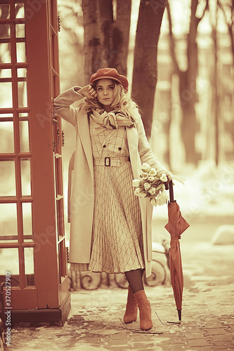 england red phone booth spring girl / london walk portrait englishwoman tourism in britain