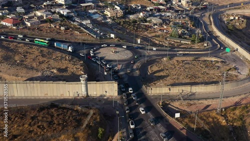 Palestine Cars waiting at Hizma Checkpoint Aerial
Traffic jam,Security tower at Hizma Town Checkpoint in North Jerusalem
 photo