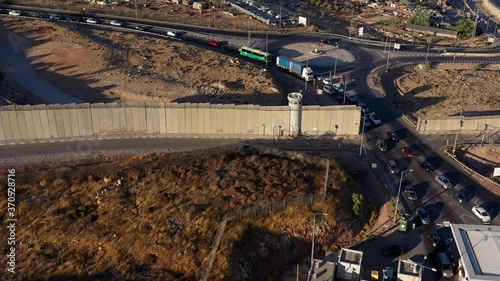 Palestine Cars waiting at Hizma Checkpoint Aerial
Traffic jam,Security tower at Hizma Town Checkpoint in North Jerusalem
 photo