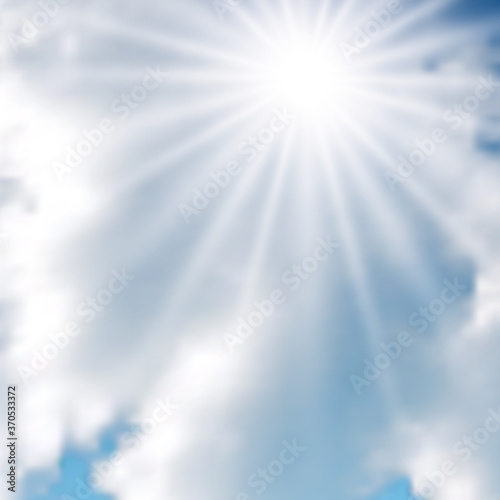 Sunny background with clouds on blue sky