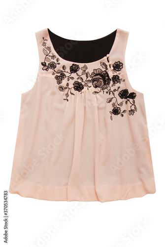 beige blouse with black embroidery is on white background