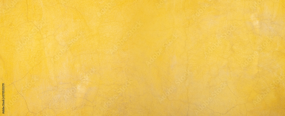 Yellow wall texture rough background abstract concrete floor or Old cement grunge background with yellow empty. Yellow wall texture rough background abstract concrete floor or Old cement grunge background with yellow empty.