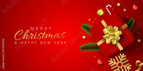 Red header or banner design decorated with gift box, baubles, snowflake and pine leaves for Merry Christmas and Happy New Year.