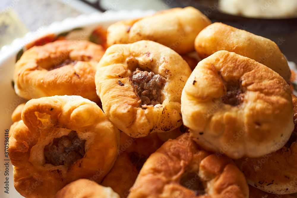Homemade Meat pies. The traditional Kazakh, Tatar and Bashkir food - belyashi.