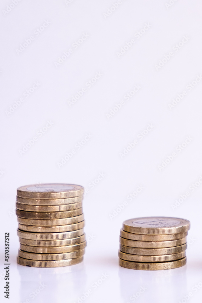 Euro coins at a white background economy europe with copy space