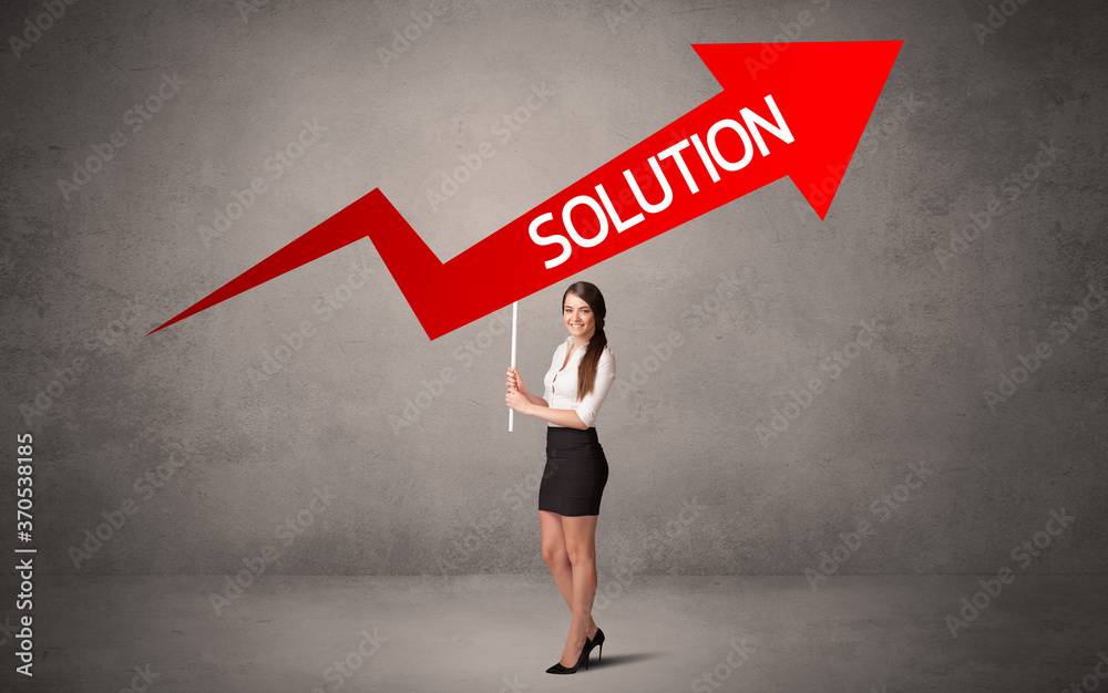 Young business person in casual holding road sign with SOLUTION inscription, business direction concept