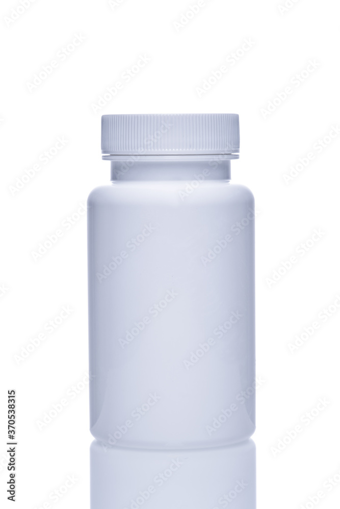 White plastic jar packaging for pills on a white background.
