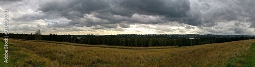 Beautiful panoramic view of a park with dark stormy clouds in the sky, Millennium parklands, Newington, Sydney, New South Wales ,Australia 