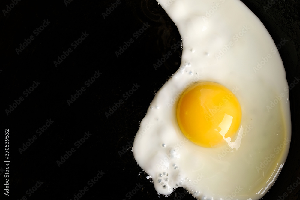 scrambled eggs in a pan copy space close-up scrambled eggs in a pan copy space close-up