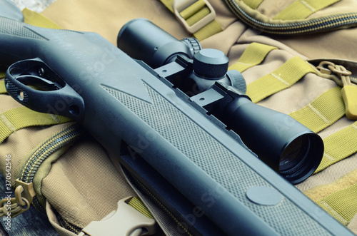 air rifle with telescopic sight , for sport hunting